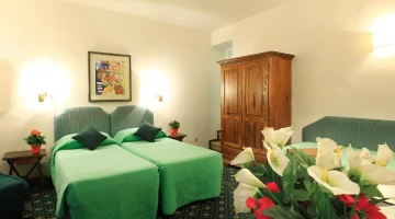 Chambre double avec lits simples
