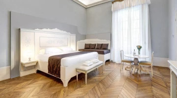 Dreibett-Juniorsuite mit Doppelbett und Schlafsofa