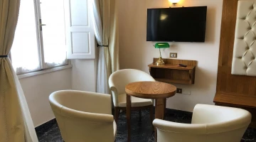Superior-Zimmer mit Sitzgelegenheiten und TV