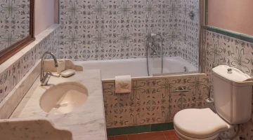 Private bathroom with bathtub