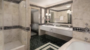 Private bathroom with separate tub and shower