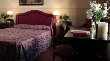 Double bed in a quadruple room