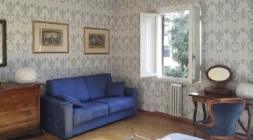 Room with sofa and desk