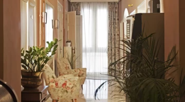 Common area with armchairs
