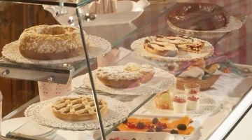 Breakfast buffet with cakes and cereals