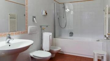 Private bathroom with bathtub