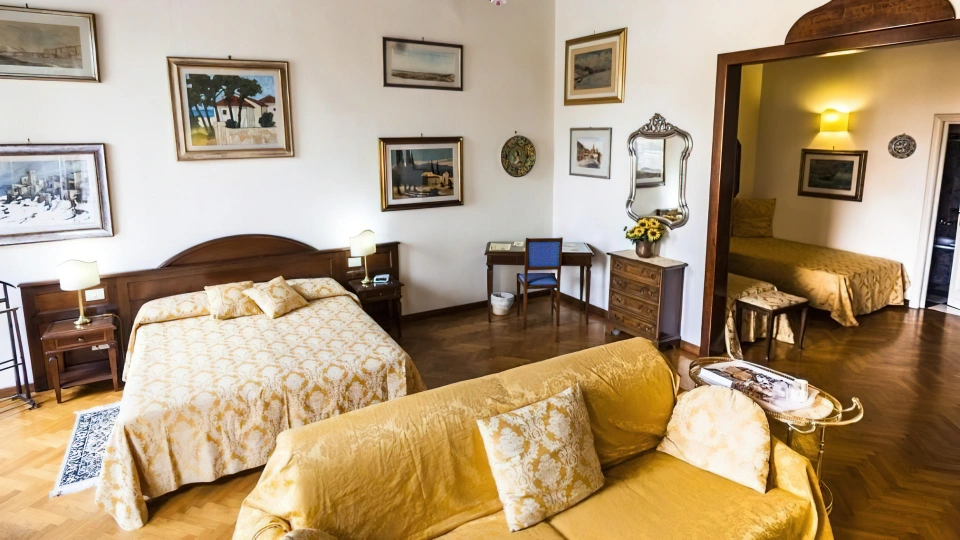 Suite avec chambre principale et espace lit simple