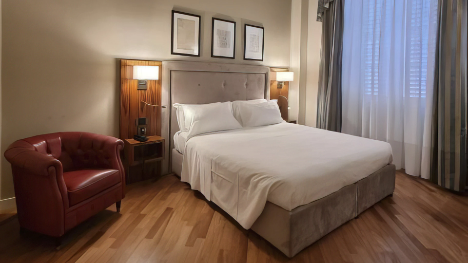 Chambre supérieure avec fauteuil