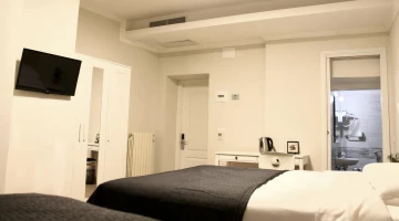 chambre double avec lits simples
