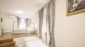 Suite deluxe con letto matrimoniale e letto singolo