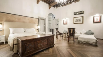 Chambre familiale avec lit double et lit simple