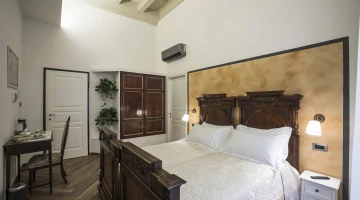 Chambre double avec deux lits simples