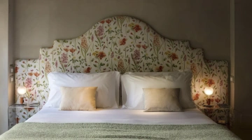 Chambre supérieure avec poutres apparentes