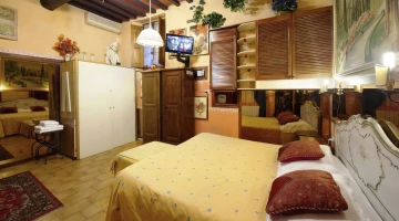 Double bedroom with wooden furnishings