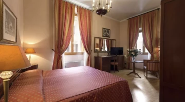 Double bedroom with large windows