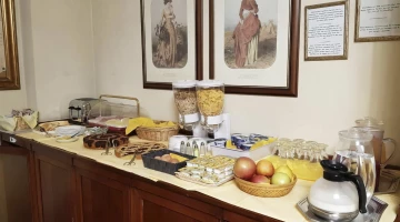 Breakfast buffet with fruit and cereals