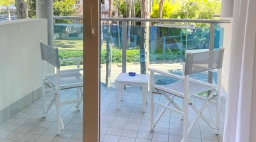 Private balcony with table and chairs