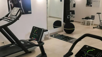 Fitness area with technogym equipment