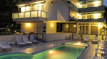 Hotel with swimming pool in the evening