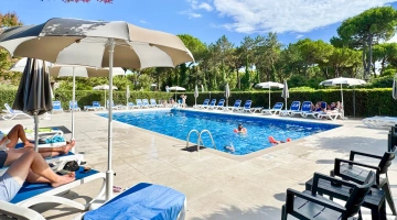 Umbrellas and sun loungers by the pool