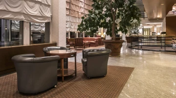 Common area with armchairs