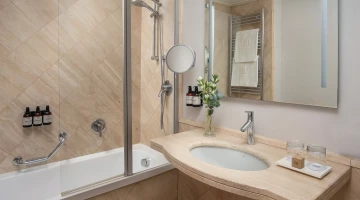 Private bathroom with bathtub