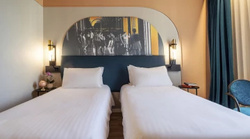 Chambre double supérieure avec lits séparés