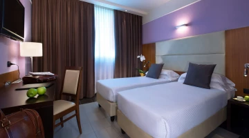 Chambre double avec lits simples