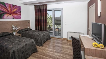 Standard-Doppelzimmer mit getrennten Betten