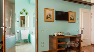 Charity room with desk and en suite bathroom
