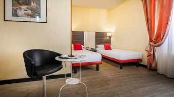 Chambre double avec lits simples