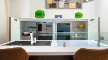 Kitchen with refrigerator and oven