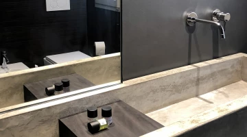Private bathroom in concrete room