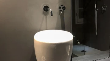 Bathroom with shower box in iron room