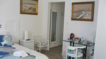Larger square room with desk