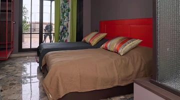 Chambre double avec lits simples