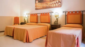Triple room with single beds
