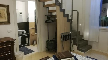 Staircase from master bedroom to loft
