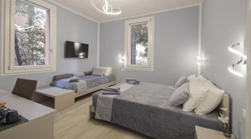 Chambre triple dans les deux tours