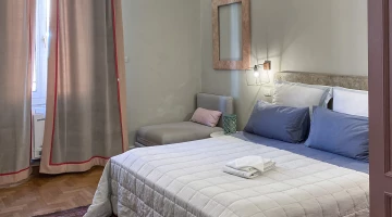 Camera quadrupla con divano letto