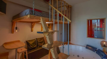 Queen suite with loft bed and whirlpool tub