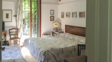 Chambre triple avec accès direct au jardin