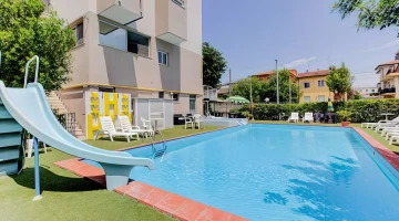 The swimming pool with the slide
