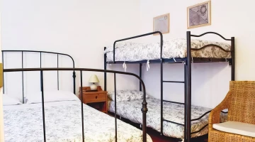 Chambre quadruple avec lits superposés