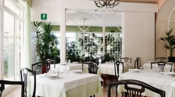 Tables set in elegant dining room