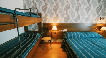 Quadruple room in classic style