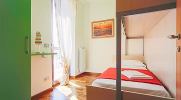 Chambre double avec lits simples