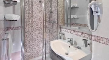 Private bathroom with shower cubicle