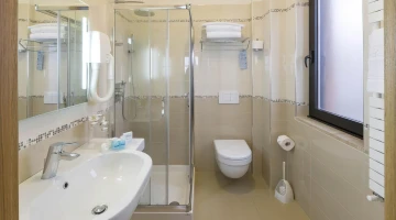 Private bathroom with shower cubicle
