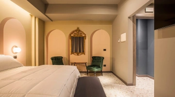 Stanza con poltroncine